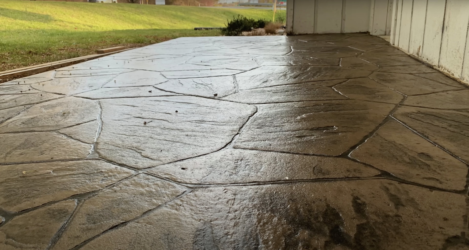 Damaged concrete driveway with cracks and wear showing need for professional repair in Henderson, KY