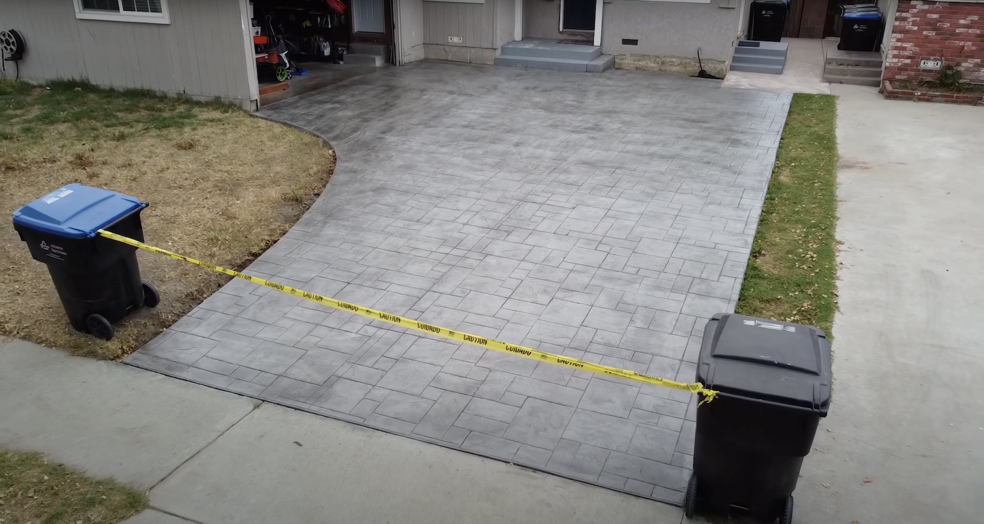 Professional concrete driveway by Henderson Concrete Pros Beautiful finished concrete driveway installation in Henderson, KY