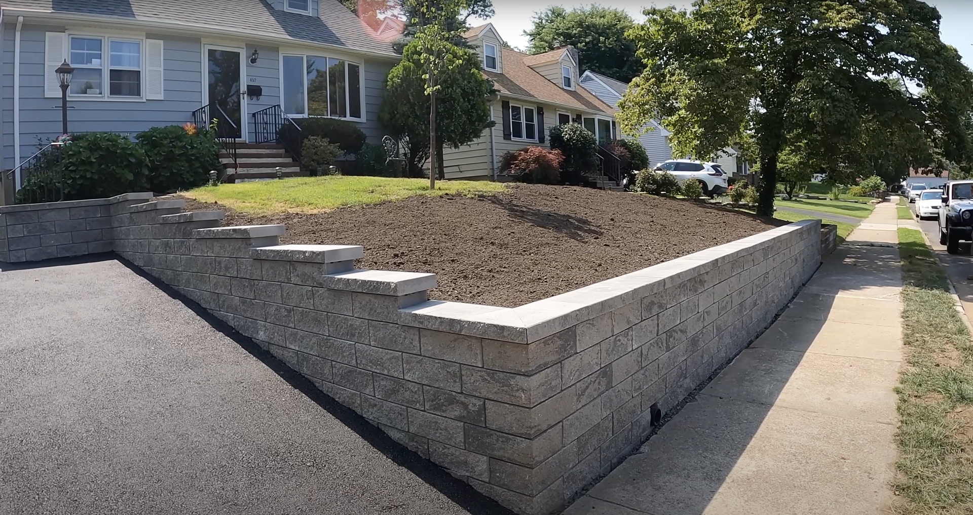 Expert concrete work by Henderson Concrete Pros team Professional concrete installation showing retaining wall expertise